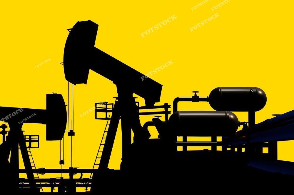 Силуэт нефтяной вышки на фоне ярко-жёлтого неба. Контрастное изображение включает в себя многочисленные элементы промышленного оборудования, такие как трубы, баки и лестницы. Выраженная монотонность жёлтого цвета подчёркивает индустриальный характер сцены.